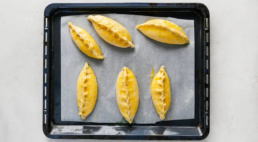 Oven-Baked Sorrel and Egg Pirozhki: A Symphony of Sweet and Tart - Walfosbrand.com