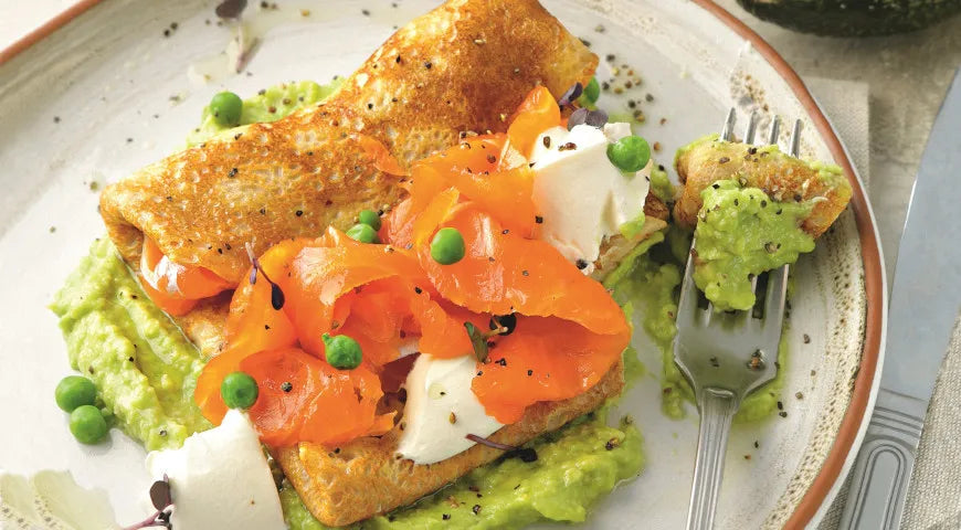 Rye Blinis with Smoked Trout, Sour Cream, and Avocado Purée - Walfosbrand.com