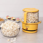 Presto 05206 Showtime Gourmet Oil Popcorn Popper - 9 filiżanek, wbudowana miska do serwowania, kompaktowa konstrukcja, ceramiczna powłoka zapobiegająca przywieraniu, bez PFAS, żółty