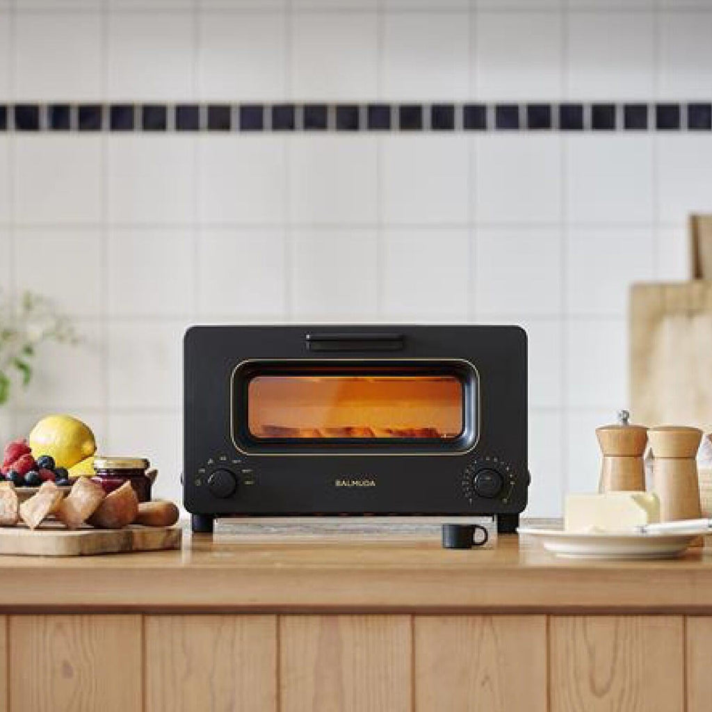 BALMUDA Toster | Toster parowy | 5 trybów gotowania: chleb kanapkowy, chleb rzemieślniczy, pizza i ciastka, piekarnik | Precyzyjna kontrola ciepła | Technologia parowa | Blacha do pieczenia | Wersja amerykańska | Czarny