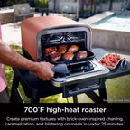 Ninja Woodfire Outdoor Pizza Oven, 8 w 1 przenośny elektryczny piec do pieczenia, nagrzewa się do 700°F, 5 ustawień pizzy Artisan, zintegrowana skrzynia do wędzenia BBQ, zawiera aromatyzowane peletki drzewne, czerwony (odnowiony)