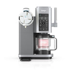A Ninja CREAMi Swirl ice cream and soft serve maker, showcasing the machine with its pints and various components, in a silver color.